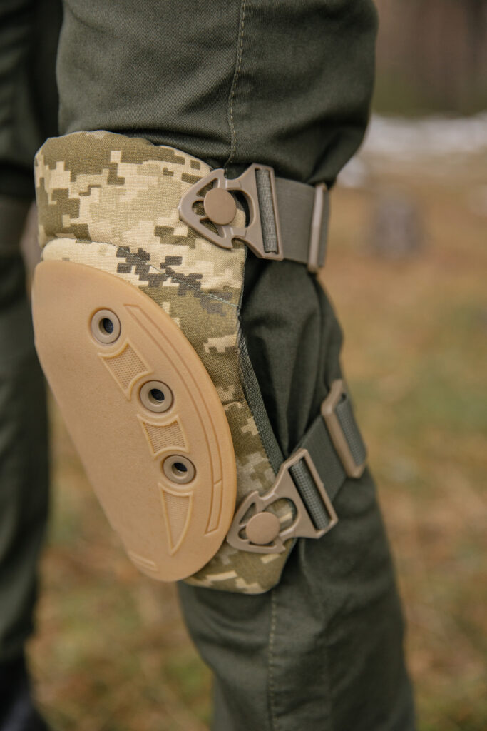close up of camouflage knee pads for military and airsoft