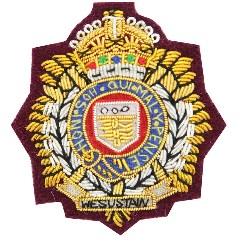 RLC Kings Crown Officers Cloth Maroon Cap Badge